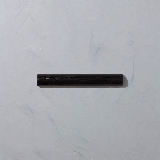 Black glazed trim tile